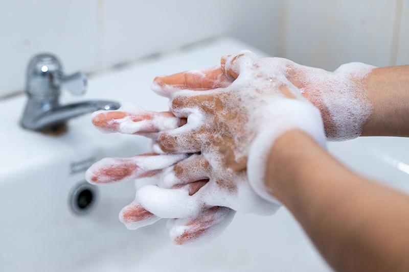 Hand washing with soap and a sink